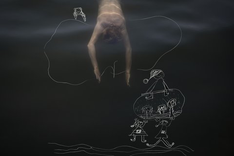 Noelles mother takes a swim and dives. Going out into nature has been helping her to cope with the death of her daughter.