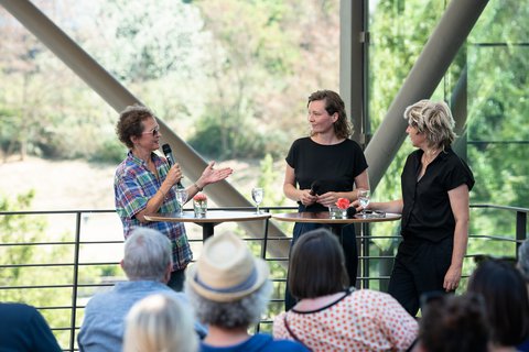 Artistic director of the Ruhrtriennale, Barbara Frey, in conversation with the artist Katja Aufleger and the artistic director of Urbane Künste Ruhr, Britta Peters, at the opening of the installation "THE HUDDLE".