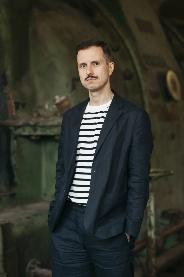 Krystian Lada, Director of Artistic Programme of the Ruhrtriennale 2024-2026, in industrial setting