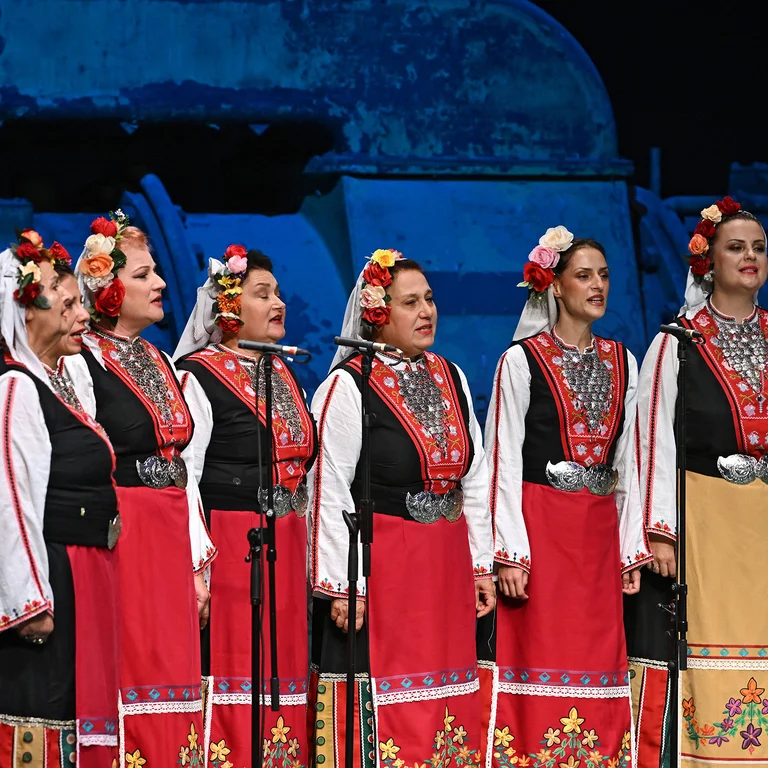 The Bulgarian women’s choir Le Mystère des Voix Bulgares in traditional Balkan costumes