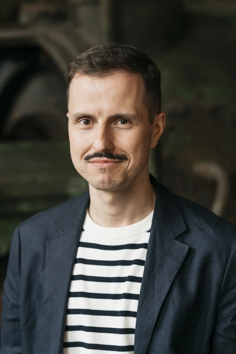 Krystian Lada, Director of Artistic Programme of the Ruhrtriennale 2024-2026, in industrial setting
