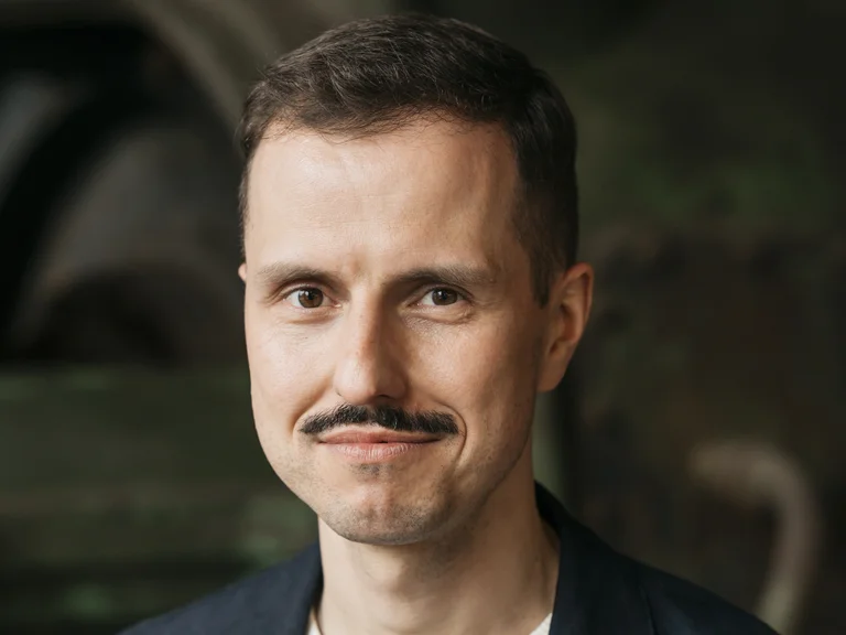 Krystian Lada, Director of Artistic Programme of the Ruhrtriennale 2024-2026, in industrial setting